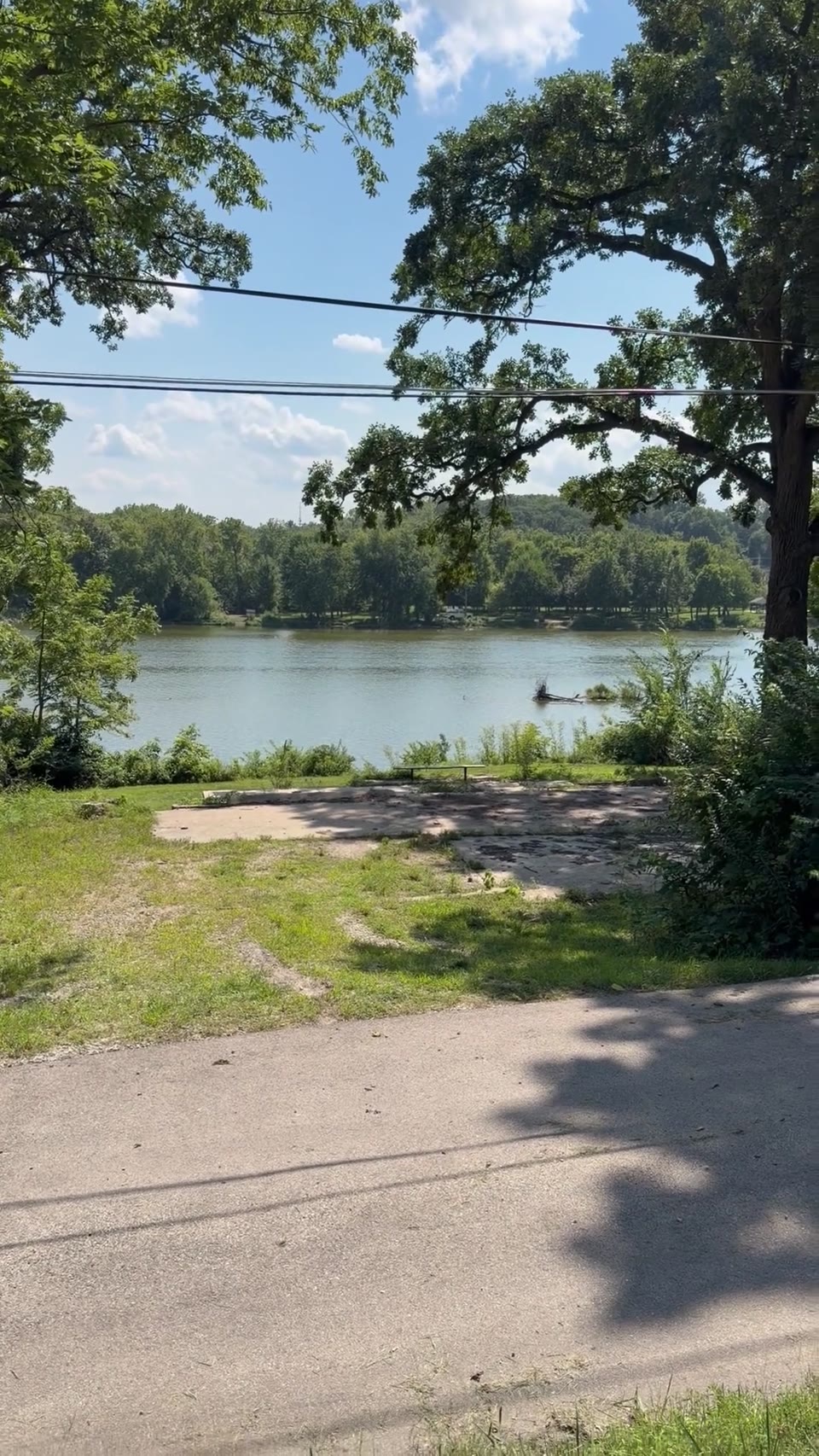 PIN 02-33-129-004. Same river lot from the road, looking at the pad and the Fox River.